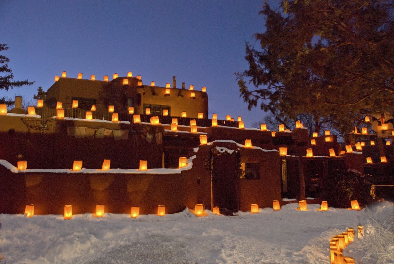 Santa Fe has four distinctive seasons and the holidays are a nice time to visit. "I love Christmas in Santa Fe," writes Whitney-Ward. "Farolitos (lighted paper lanterns) march down every rooftop and along walls and pathways."