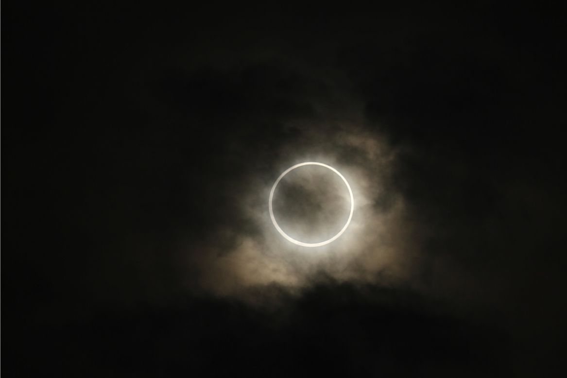 A rare solar eclipse is seen from Tokyo on Monday morning. People across the globe planned viewing parties to watch the event.