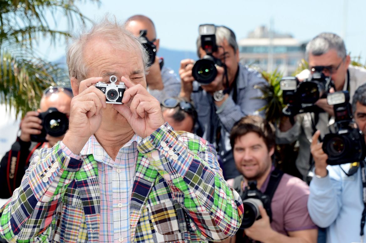 Bill Murray poses with a miniature camera at the photocall for "Moonrise Kingdom" on Wednesday, May 16. The latest film from director Wes Anderson served as this year's curtain raiser.