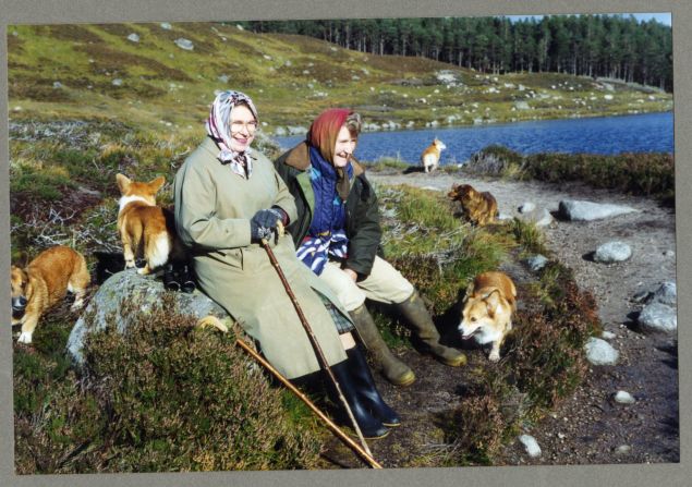 Rhodes sits resting with the Queen during a trek through deer-stalking area at Balmoral.