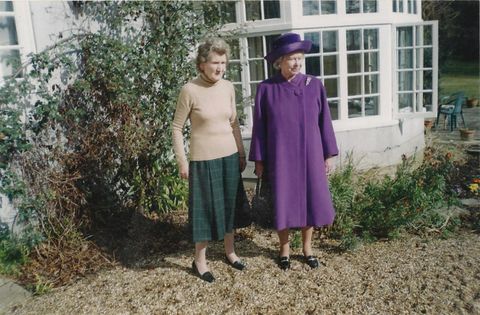 Rhodes was also one of the queen's bridesmaids. The pair are pictured at Garden House, Rhodes' home in Windsor, England. 
