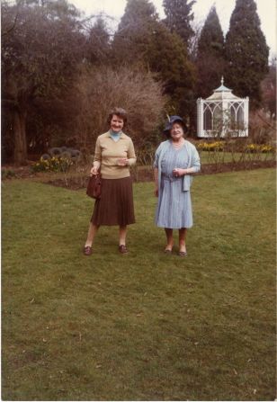 Rhodes pictured with the Queen Mother in 1982.