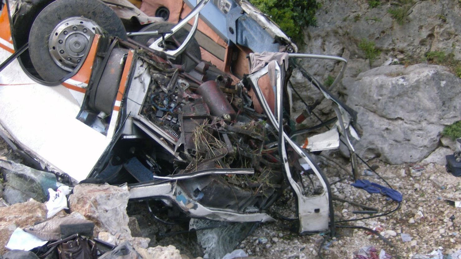 Albanian authorities say a bus carrying university students fell off a cliff Monday, killing at least 12 people.