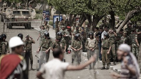 Egyptian protesters confronting army troops outside the Defense Ministry in Cairo's Abbassiya district on May 4. 