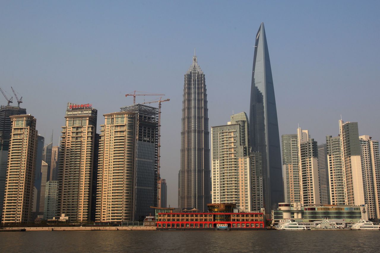 Completed in 2008, Shanghai World Financial Center has an architectural height of 1,614 feet (492 meters) and is occupied to a height of 1,555 feet (474 meters). 