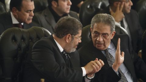 Leader of the Freedom and Justice Party, Mohamed Morsi (left).