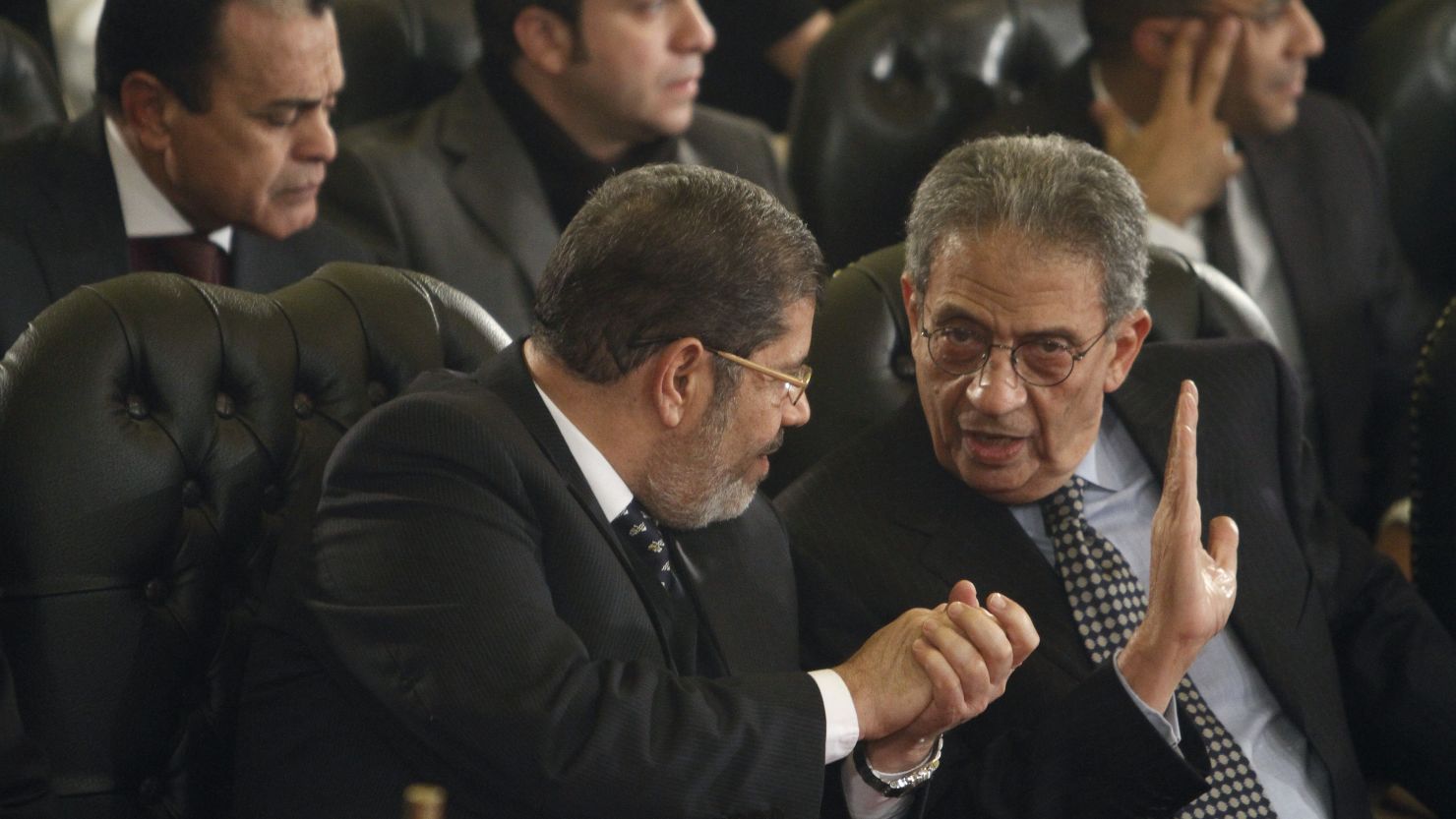 Leader of the Freedom and Justice Party, Mohamed Morsi (left).