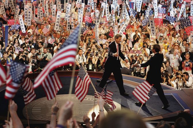 Sen. John Kerry, the 2004 Democratic presidential candidate, greets his running mate, Edwards, at the Democratic National Convention in Boston.