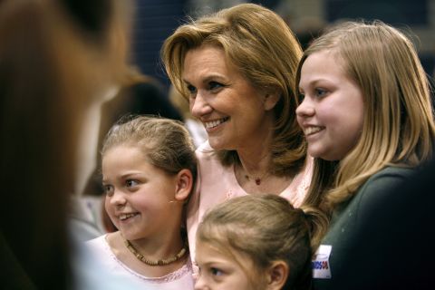 Edwards' wife, Elizabeth, meets with children after a town-hall gathering in Iowa in 2007. She passed away in 2010 from breast cancer after separating from Edwards.