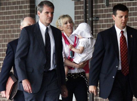 Rielle Hunter, Edwards' former mistress, holds their daughter, Frances Quinn Hunter, in August 2009. Prosecutors accused Edwards of using nearly $1 million in illegal campaign contributions to keep his pregnant mistress under wraps as he ran for president in 2008. Defense attorneys argued the donations could not be considered campaign contributions. They said Edwards was guilty of being a bad husband but had committed no crime.