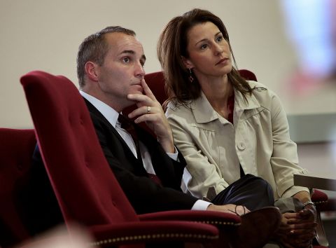 Former Edwards aide Andrew Young and his wife, Cheri, listen during a 2010 hearing in North Carolina. Defense attorneys argued that Young used the money for his own gain and to pay for Hunter's medical expenses to hide the affair from Edwards' wife.