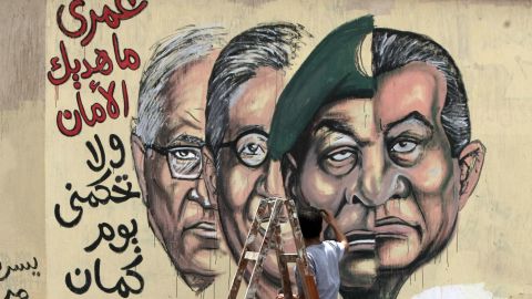 Cairo  graffiti pictures, from right, Hosni Mubarak, military ruler Hussein Tantawi and candidates Amre Mussa and Ahmed Shafiq.