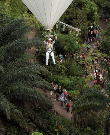 Television presenter Ben Fogle made a dramatic entrance as he carried the flame in a hot air balloon inside the rainforest biome -- known as the Eden Project -- in Cornwall, on day two of the relay.