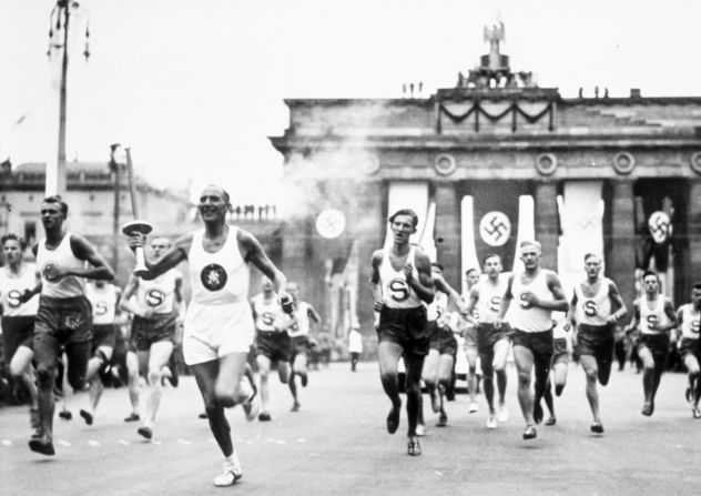 The torch relay was first used at the 1936 Olympics in Berlin, an idea instigated by Germany's then Nazi government. The flame was lit in Olympia, Greece, then carried to the Berlin stadium by runners through Bulgaria, Yugoslavia, Hungary, Austria and Czechoslovakia -- countries that would later fall under Hitler.