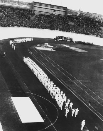 The Olympic flame originated in ancient Greece, where a fire was kept burning throughout the Games. The tradition was reintroduced at the 1928 Amsterdam Olympics, pictured here during the opening ceremony.