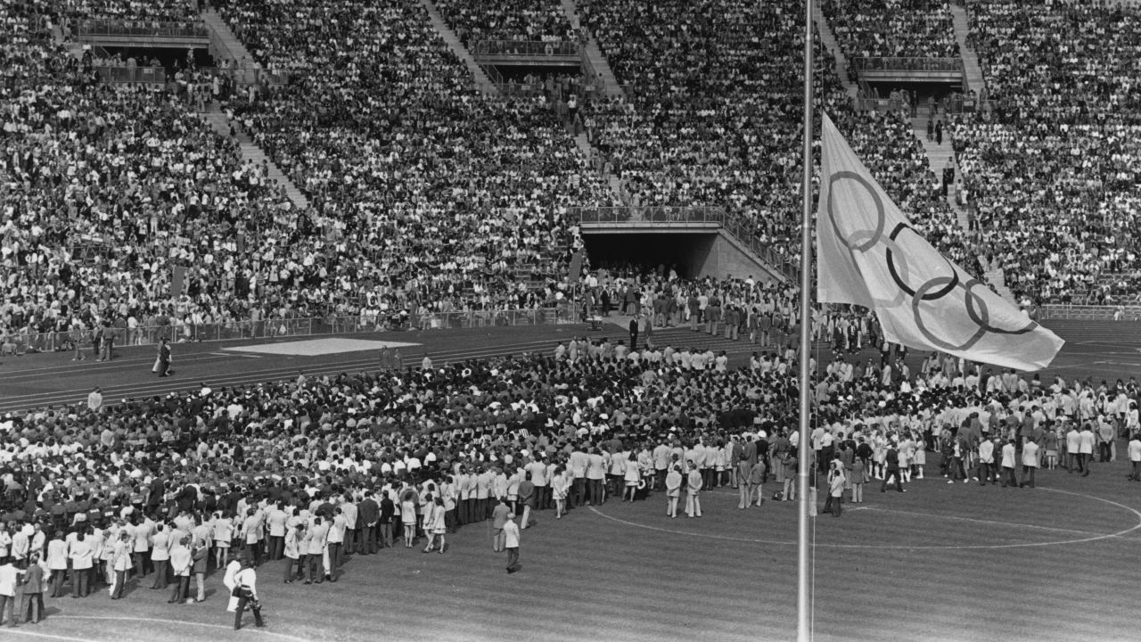 A memorial service is held during the 1972 Munich Olympics for the Israeli athletes and coaches killed by Palestinian terrorists.