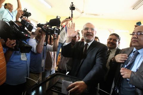 Presidential candidate Abdelmonen Abol Fotoh, a moderate Islamist, casts his ballot Wednesday in Cairo.