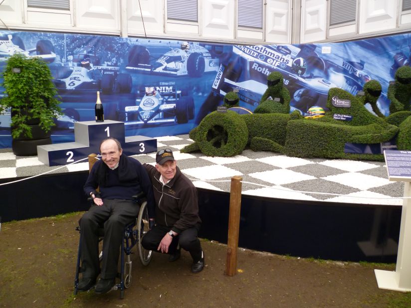 Williams co-founder and team principal Frank Williams alongside Paul King, the owner of the King and Co nursery.