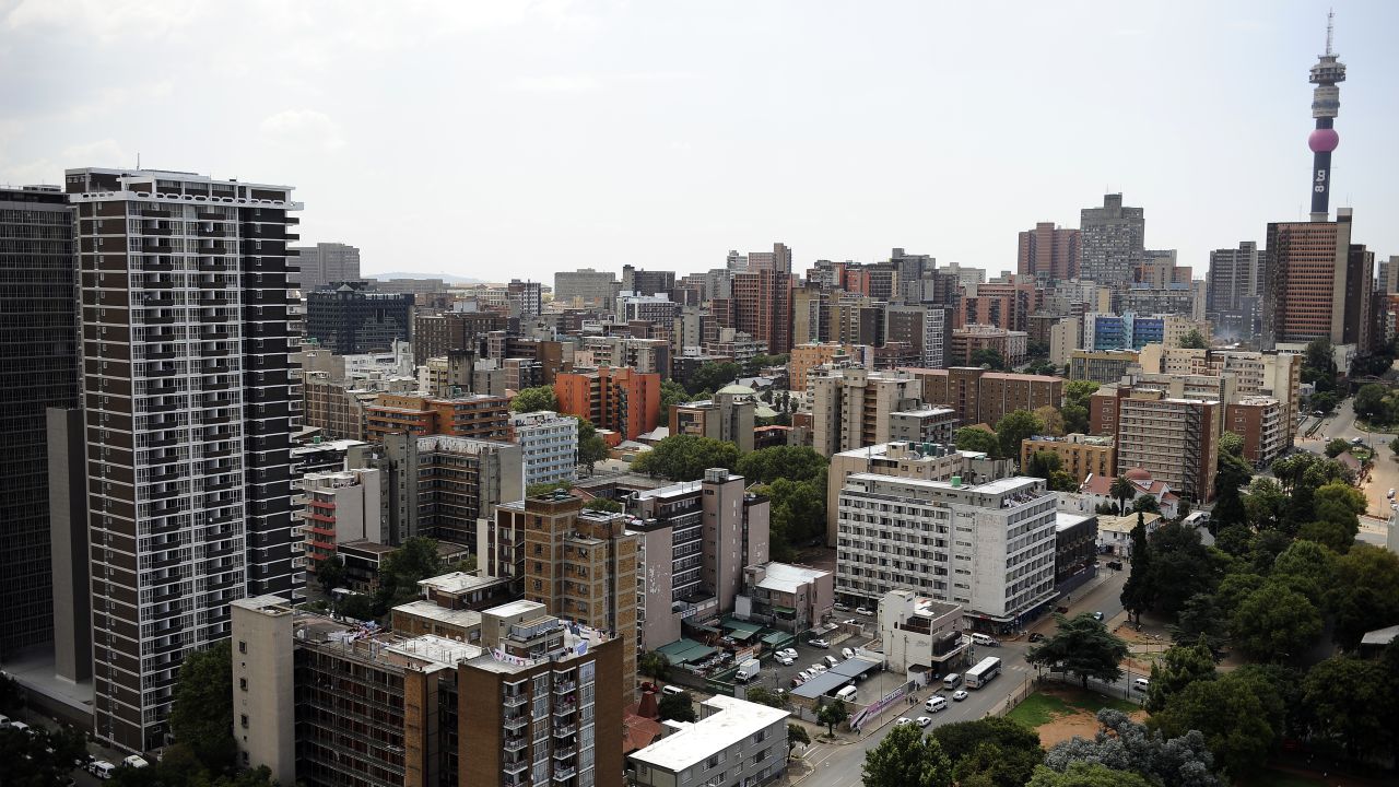 An aerial view of downtown Johannesburg, with the 269m Hillbrow Tower, Africa's tallest structure, in the background. The city center has been the site of intensive rejuvenation efforts following years of urban decay in the 1990s.