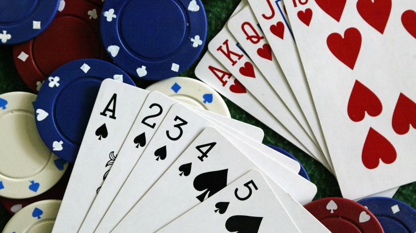 A Straight Flush (L) and a Royal Flush (R) are displayed 12 January 2005 in Miami, Florida.