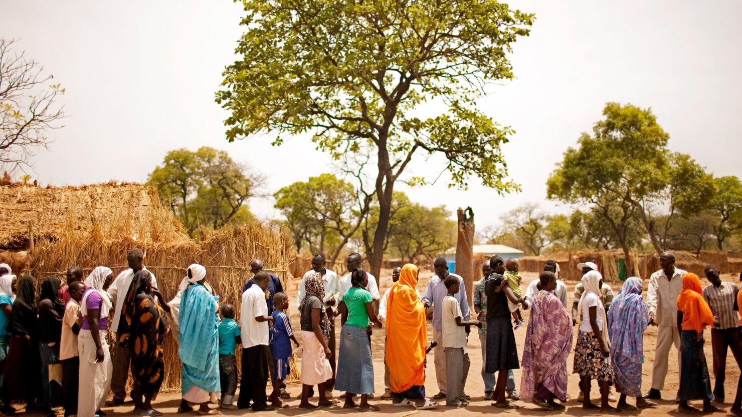 Nuba refugees "exchange the peace" after a church service in the Yida refugee camp, South Sudan, April 2012.