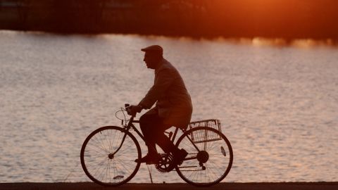 A man rides his bike in Cambridge, Massachusetts. The state ranked as third most bicycle-friendly in the nation.