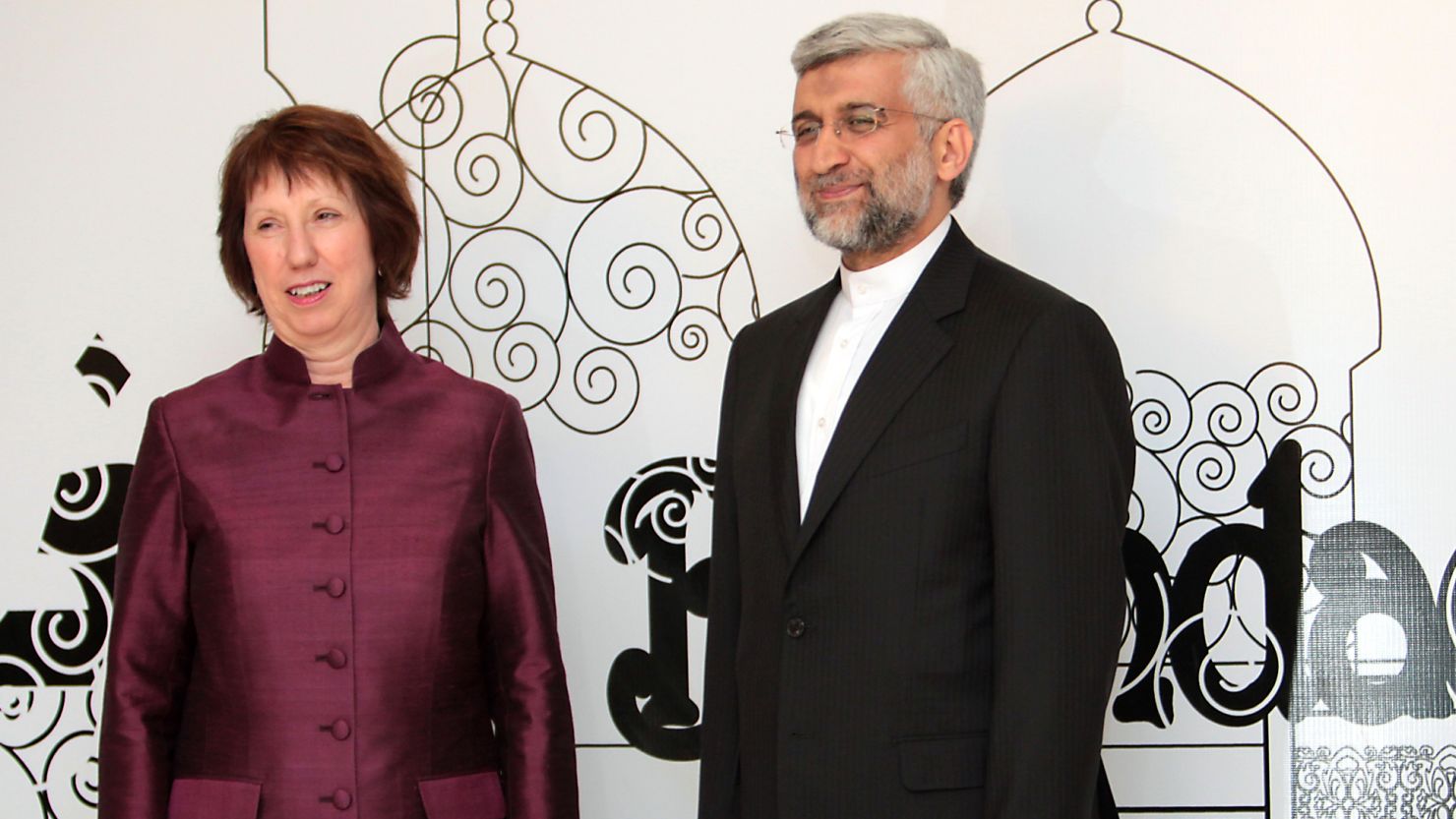Iran's chief nuclear negotiator, Saeed Jalili, right, poses with EU foreign policy head Catherine Ashton.