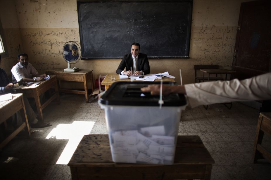 Electoral officials monitor voting in Namul, a village north of Cairo, on Thursday, May 24, the second and final day of voting in Egypt's historic presidential election. Egypt is holding its first presidential election since last year's toppling of Hosni Mubarak, part of the wave of Arab Spring uprisings.