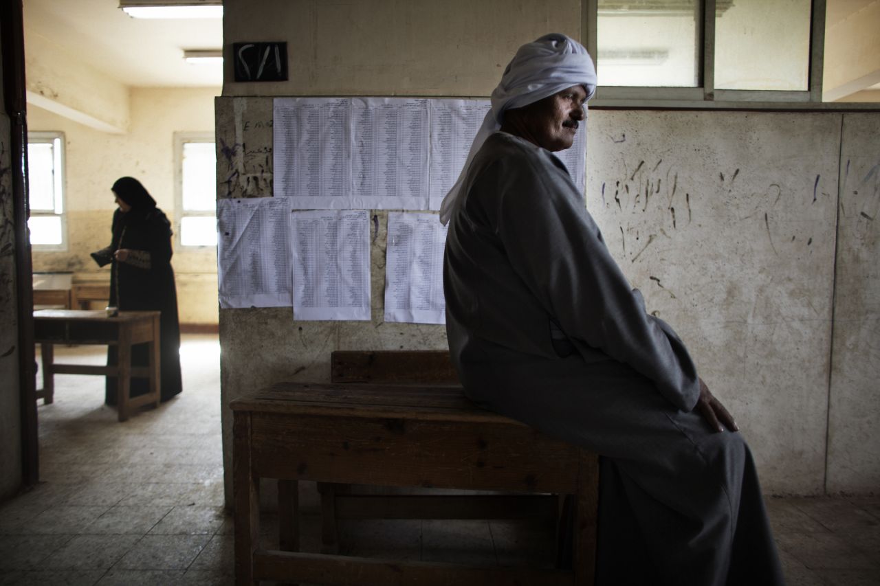 An Egyptian man waits to cast his ballot Thursday north of Cairo. The vote is considered Egypt's first free and fair presidential election in modern history. 