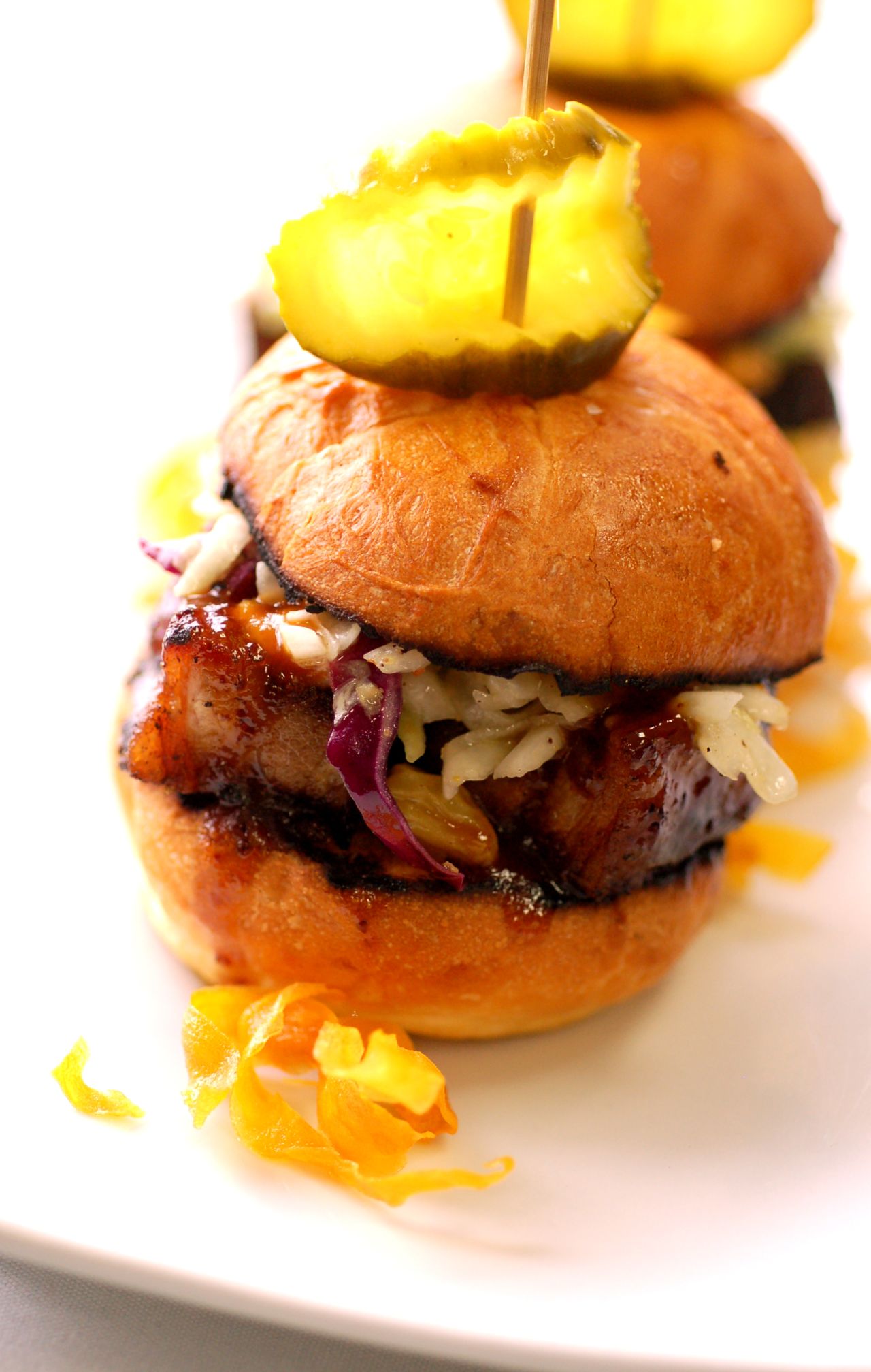 Pork belly sliders, a customer favorite at One Flew South.