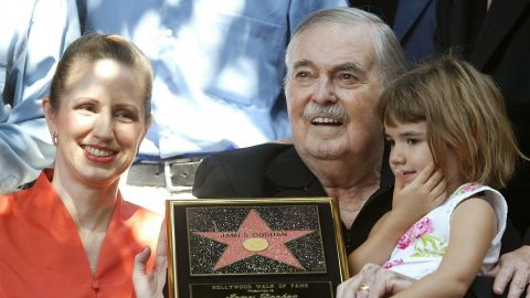 Actor James Doohan celebrates getting a star on the Hollywood sidewalk in 2004 with his wife, Wende, and daughter Sarah.