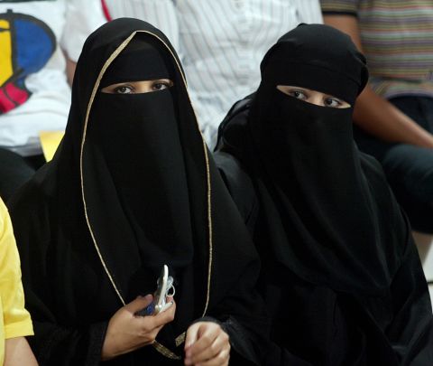 Most Emirati women wear the traditional abaya -- long, loose robes that cover the whole body -- here worn with the niqab, which covers the face.