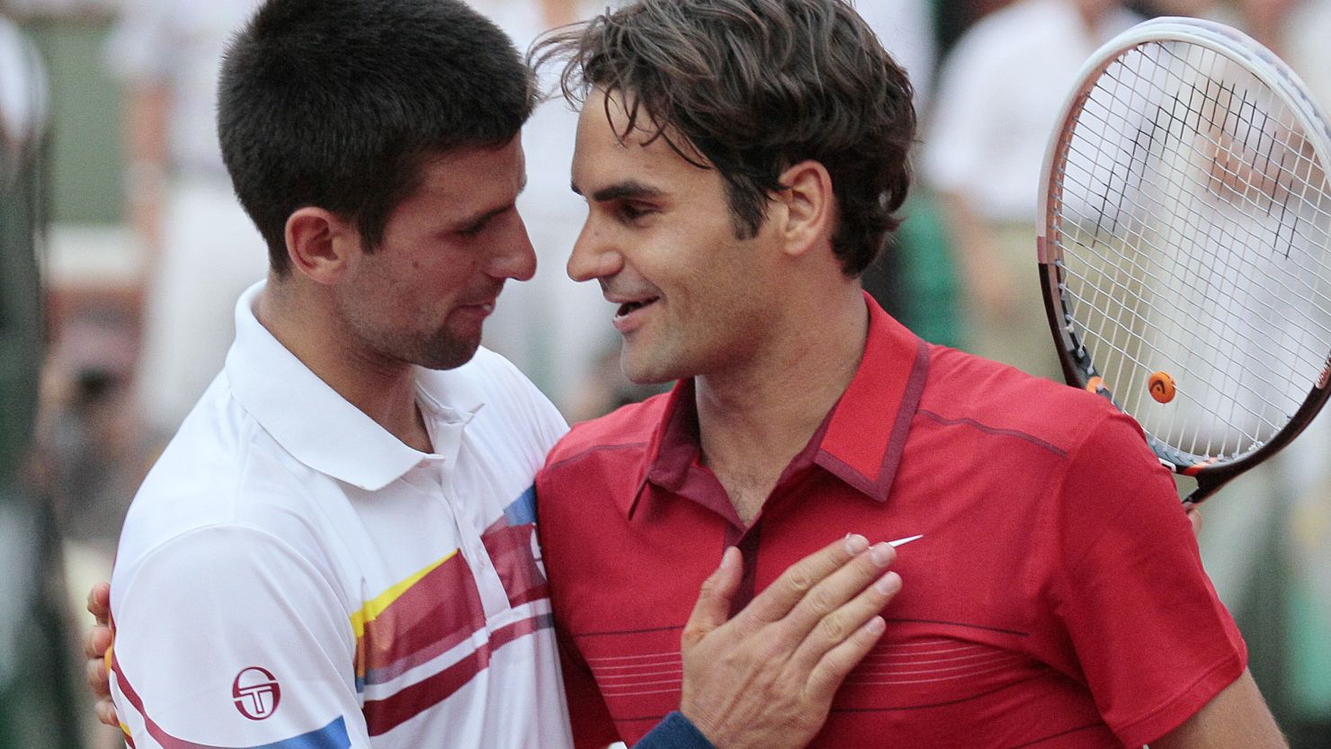 Novak Djokovic congratulates Roger Federer after the Swiss star beat him in the semifinals of the 2011 French Open. 