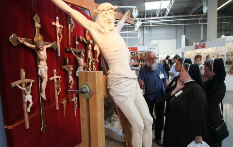 Crucifixes large and small are available for churches in Europe's biggest fair devoted to sacral art. 