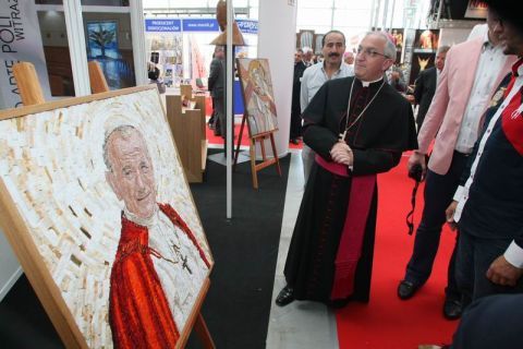 Apostolic Nuncio to Poland Archbishop Celstino Migliore gets a grand tour of the reliquaries and kitsch on show at last year's expo. 