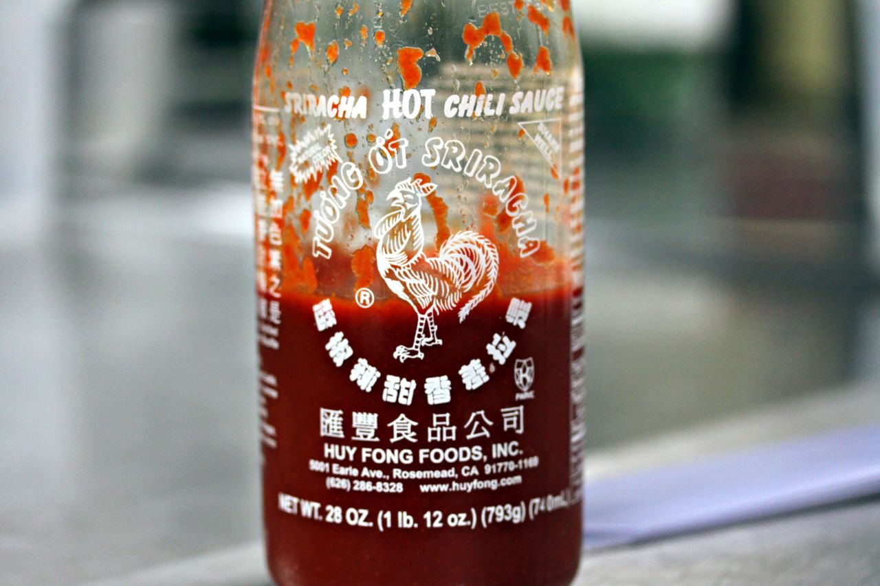 Perhaps all we need to make those insects go down easier is a little splash of hot sauce -- but perhaps not Sriracha for now. The producer of the popular condiment was ordered by a judge in Los Angeles County to suspend operations at a plant in the city of Irwindale that local residents claim has caused an overpowering odor. Panic, shockingly enough, ensued as fans of the brand began to hoard bottles of their beloved "rooster sauce."