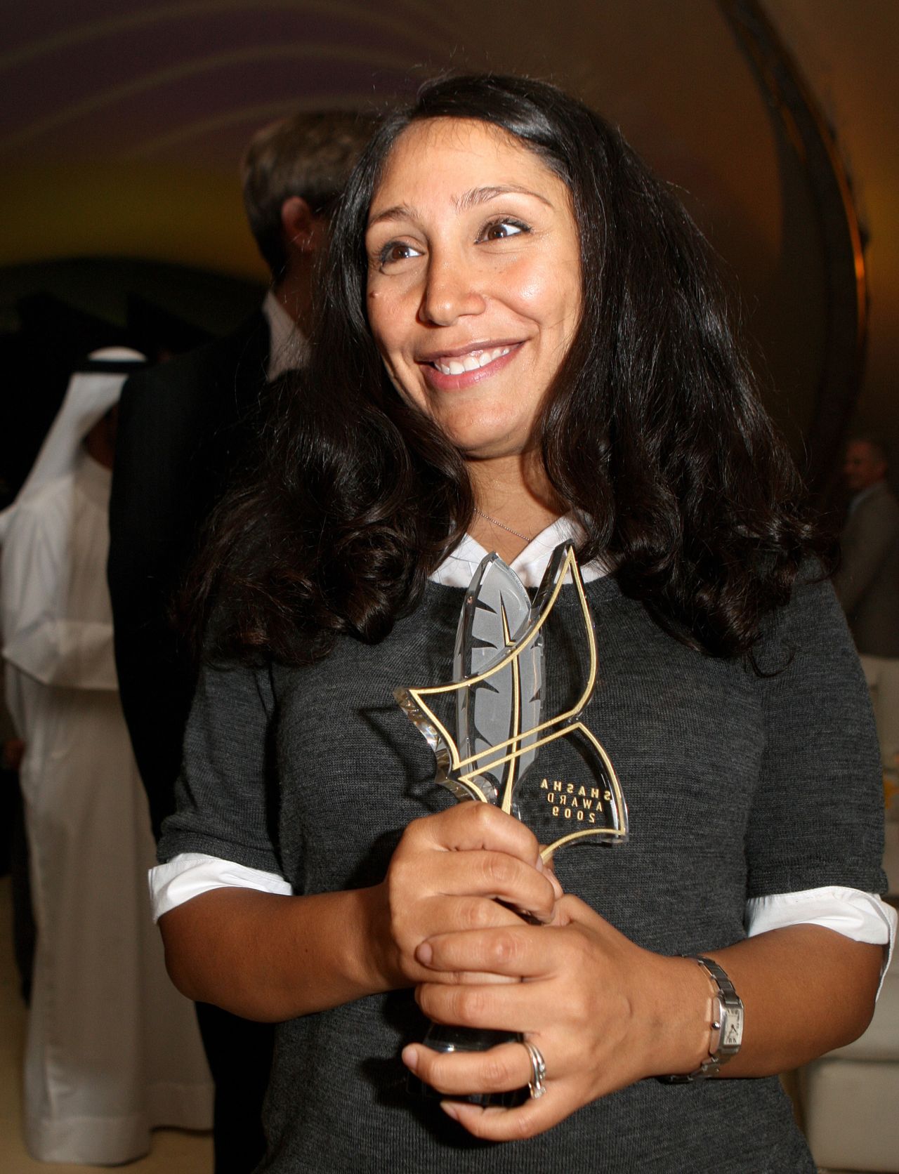 Al Mansour holds her trophy after winning the Shasha Grant, worth $100,000, for the Wajda screenplay, in 2009. The Shasha Feature Film Screenwriting Competition is run by the Abu Dhabi Film Commission, and is open to scriptwriters who are from the Middle East, or have Middle Eastern parents. 