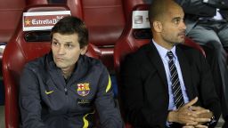 Pepe Guardiola and his successor Tito Vilanova sit in the dug out during the Copa del Rey final win.