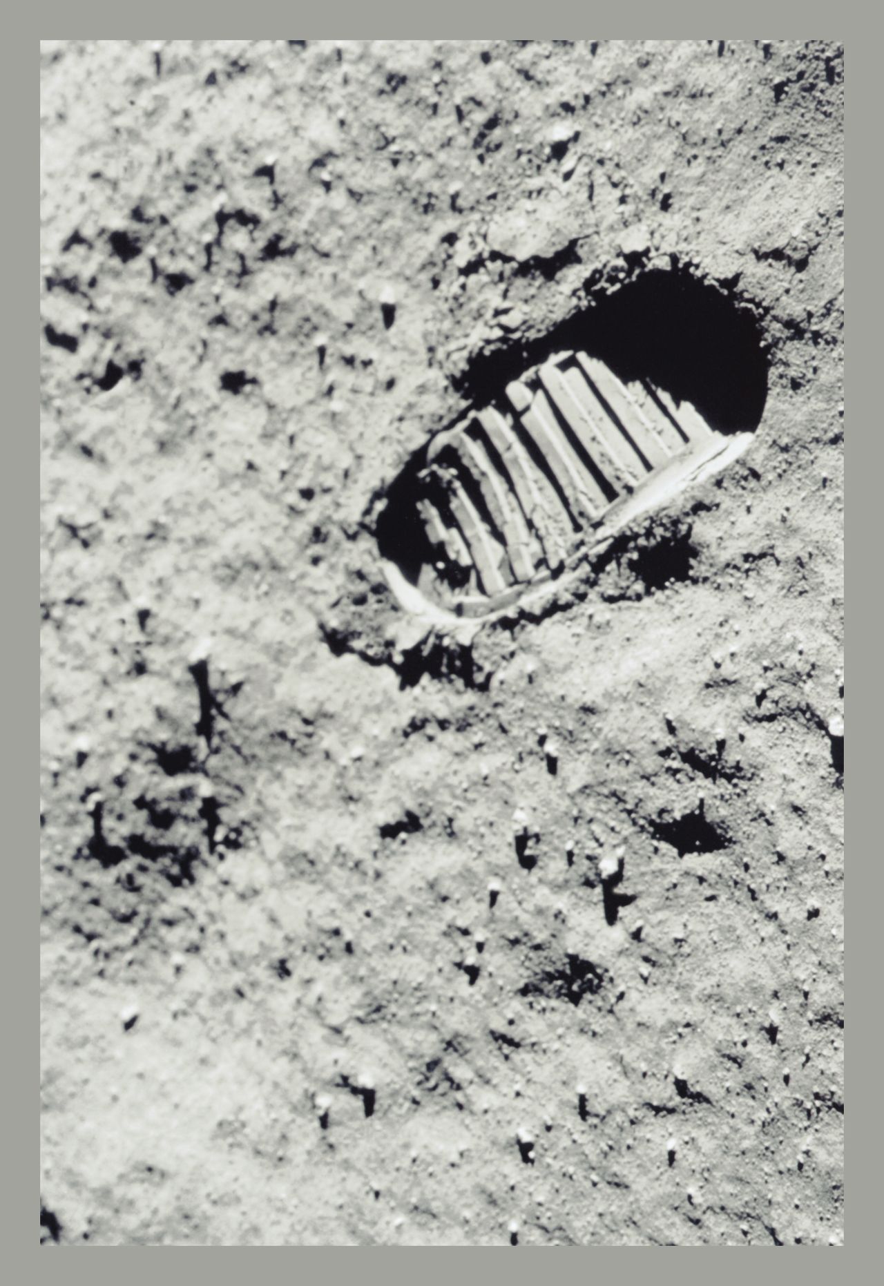 Neil Armstrong (whose footprint is shown on the moon's surface) had to override the Eagle lunar module's autopilot in order to prevent the craft from landing on the slope of a crater.