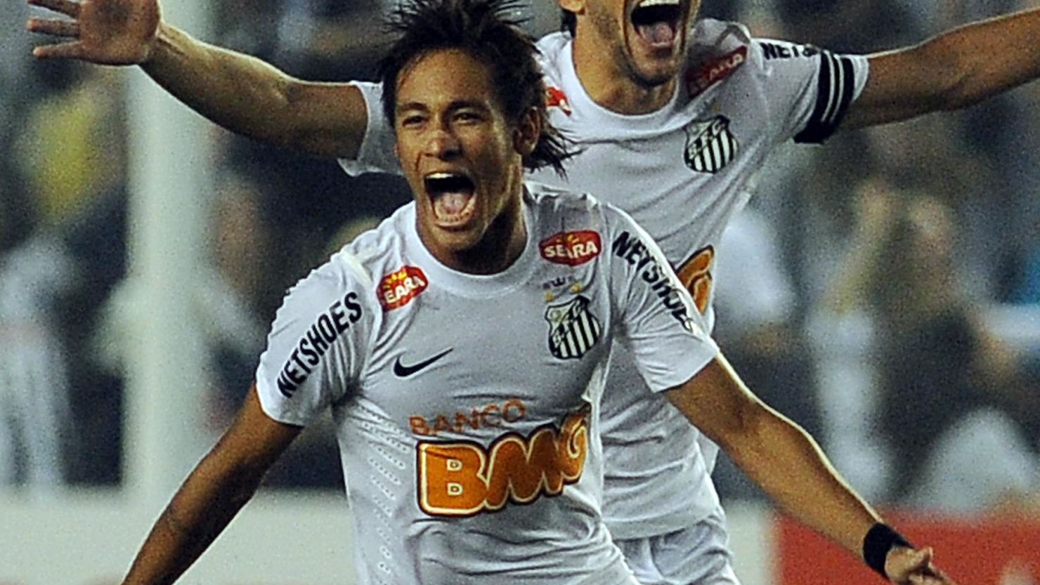 Striker Neymar, who has been linked with a host of European clubs, celebrates Santos' win.
