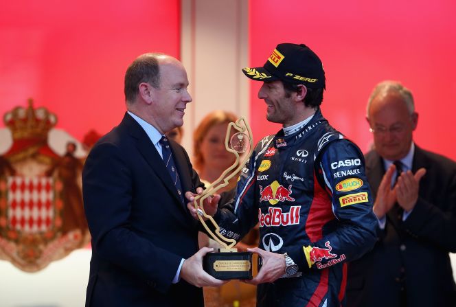 Mark Webber receives the winning trophy from Prince Albert II of Monaco after his superb victory from pole. 