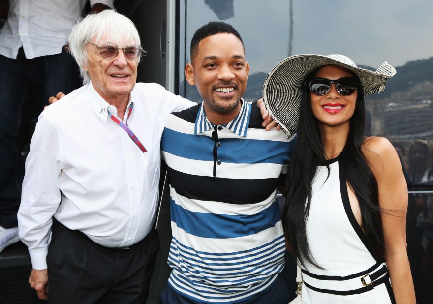 F1 supremo Bernie Ecclestone with Hollywood actor Will Smith and Lewis Hamilton's girlfriend Nicole Scherzinger. 