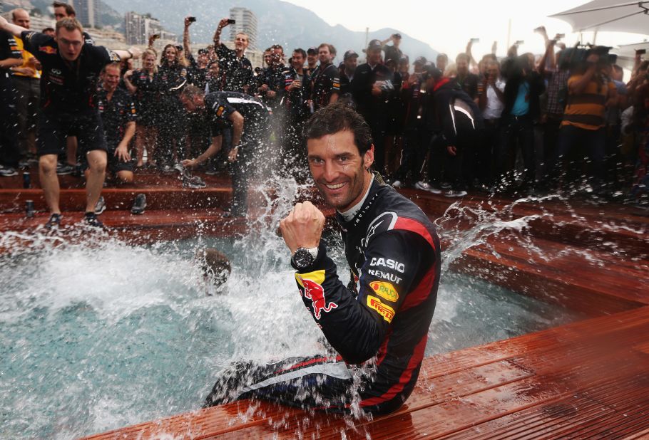 Webber takes a post-race dip as the Red Bull team celebrate a third consecutive Monaco triumph.  