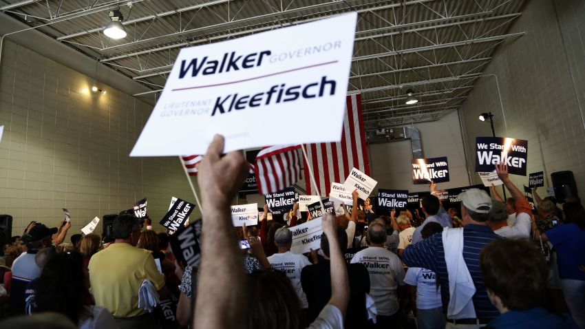 Supporters cheer for Republican Wisconsin Gov. Scott Walker as he campaigns ahead of the June 5 recall election.
