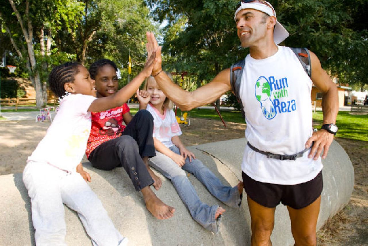 Baluchi says he runs to help children around the world realize anything is possible.