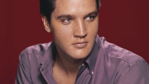 A portrait of cultural icon Elvis Presley circa 1956.