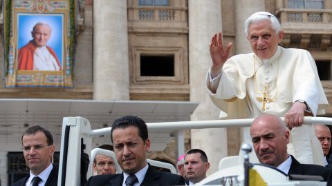Pope Benedict XVI  travels with his butler Paolo Gabriele, center, who was arrested in connection with leaked papal documents.