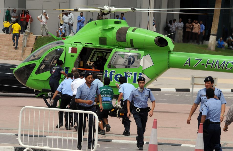 A rescue helicopter waits to transport victims to the hospital.