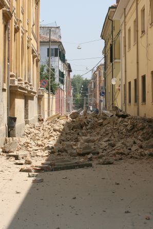 Fallen buildings fill the street in Mirandola; one of the towns closest to the quake's epicentre and an area that eyewitnesses say was most heavily damaged.