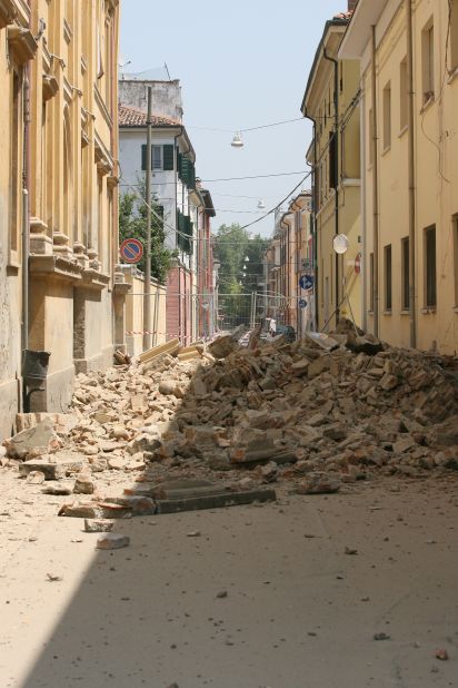 Fallen buildings fill the street in Mirandola; one of the towns closest to the quake's epicentre and an area that eyewitnesses say was most heavily damaged. 